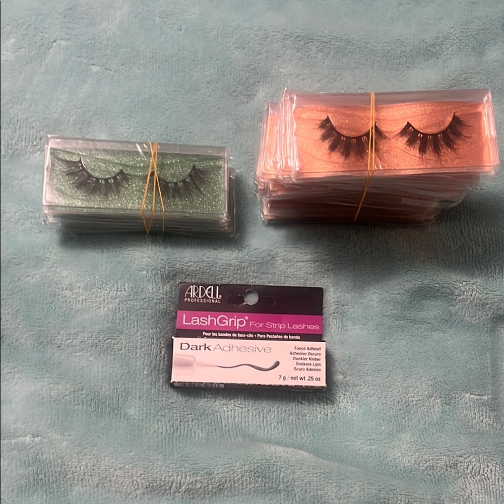 Bundle of strip eyelashes and Ardell lash glue